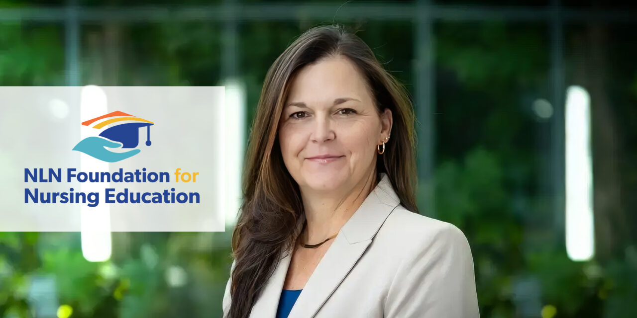 Dr. Lynn Bilder standing outside Joyce University campus
