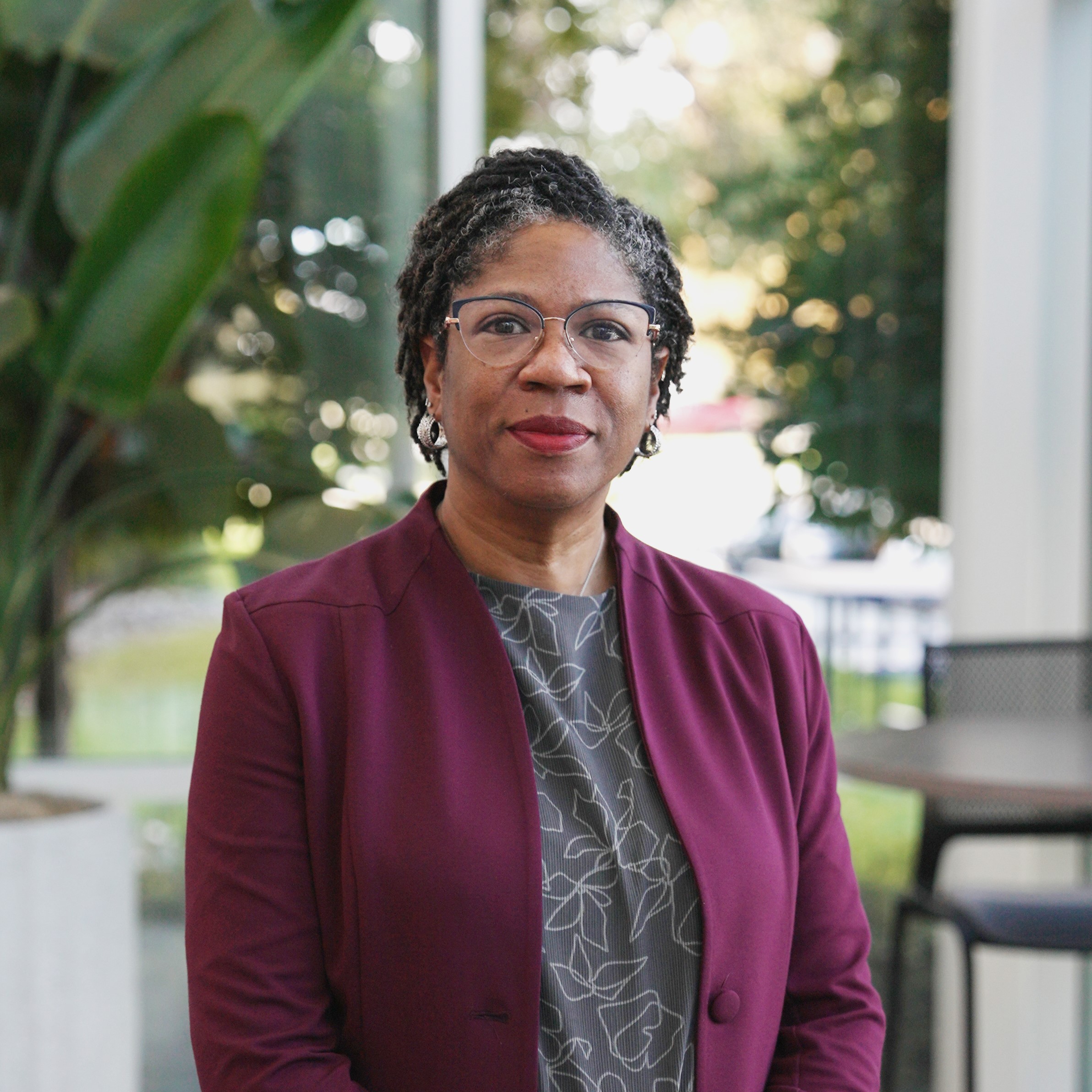 Shelley Johnson Provost/Chief Academic Officer standing in front of campus atrium