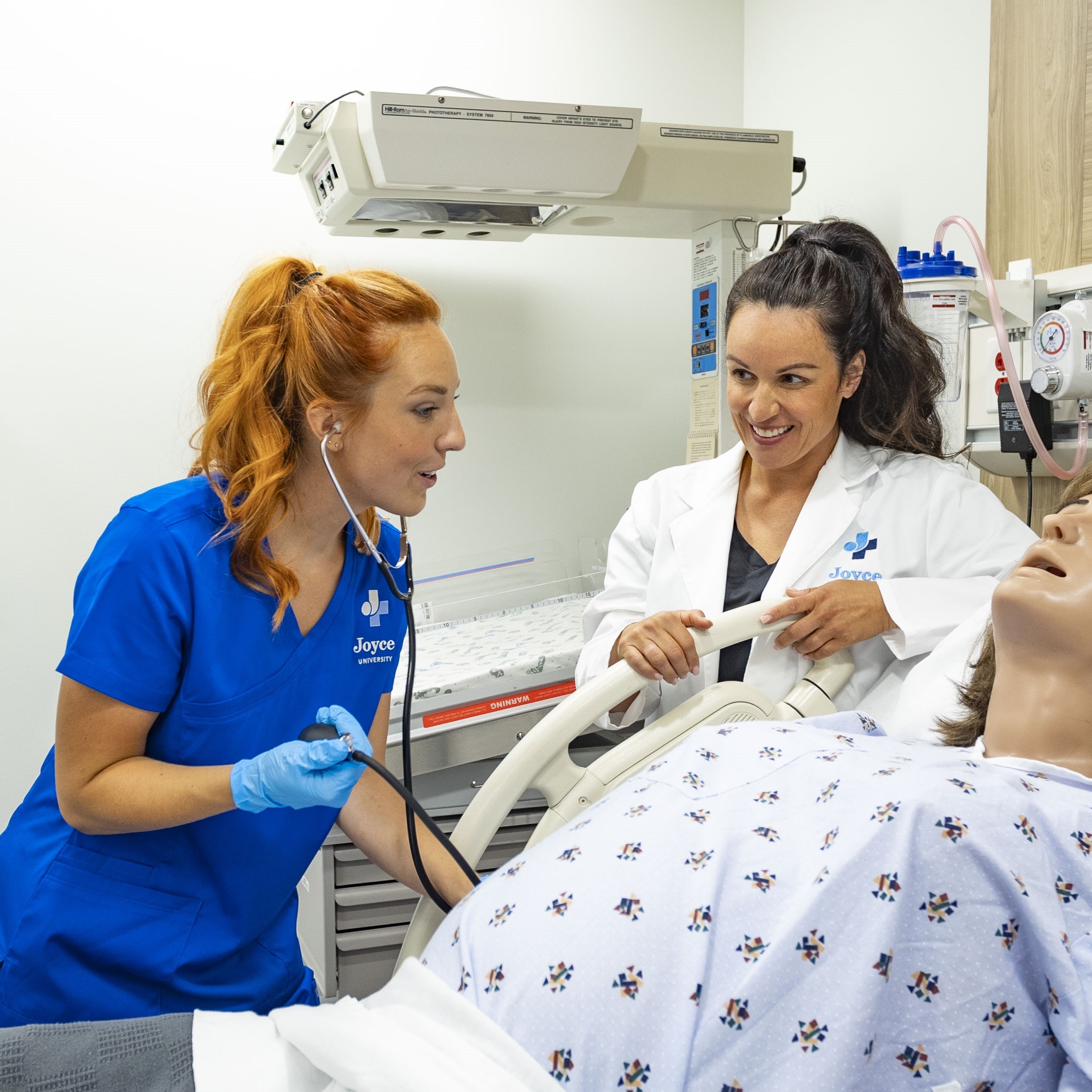 texas nursing student in the joyce simulation center learning with an instructor