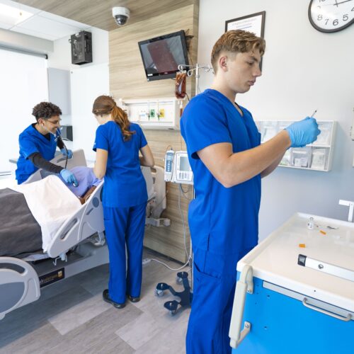 ohio students in the joyce simulation center practicing on a high fidelity mannequin 