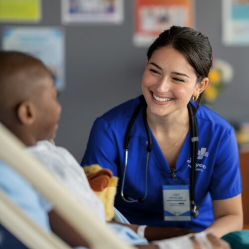joyce nursing student with pediatric patient during clinical rotation in south dakota