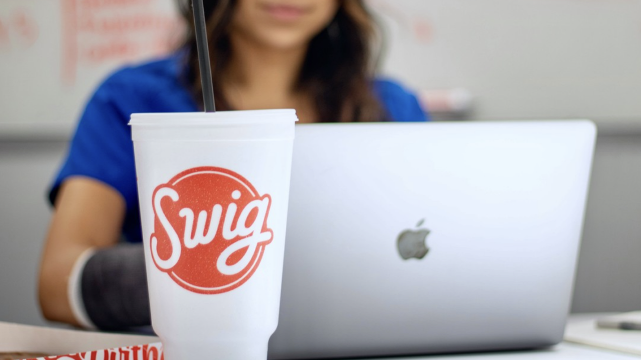 joyce nursing student learning remotely while drinking a swig on national nurses day